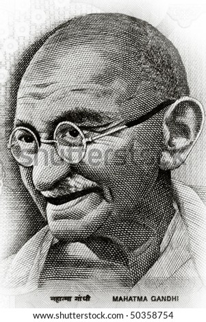 Close up shot of Gandhi on rupee note Royalty-Free Stock Photo #50358754