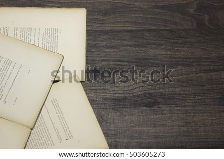 manuscript on the wooden background