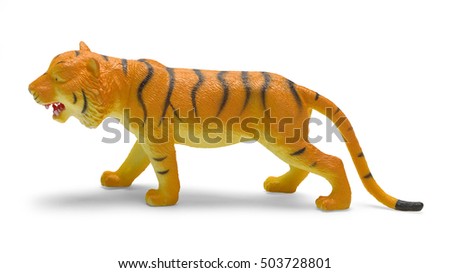 Plastic Tiger Toy Side View Isolated on White Background.