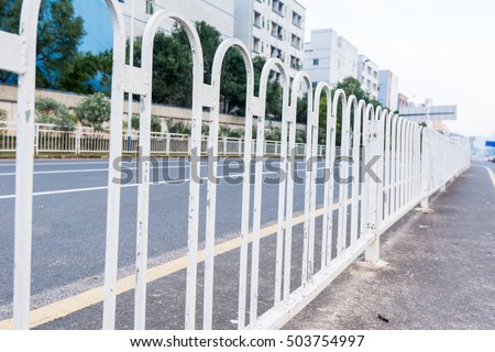 White steel center median driver fence in the road in Shenzhen, China