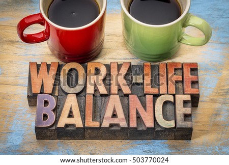 work life balance concept- word abstrac tin vintage letterpress wood type with two cups of coffee