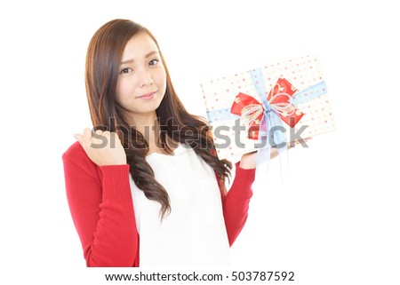 Smiling woman with a gift