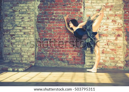 Ballerina dancing indoor, vintage. Healthy lifestyle ballet. Grace and performance of young beautiful girl. Ballet school. Stretching exercise