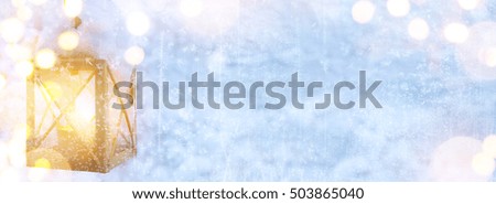 Blue Christmas; Holidays light background with Xmas decoration  on snow