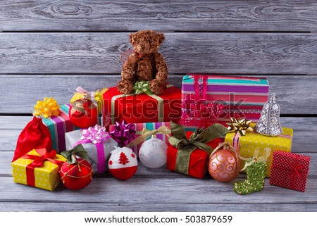 Pile of Christmas gifts, balls and toys. Christmas gifts for children. Christmas mood.