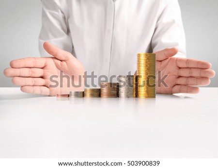 Coin to money in human hand, business ideas