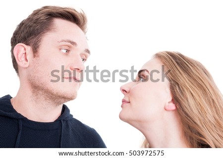 Couple looking at each other like a confrontation  isolated on white background with copy text space