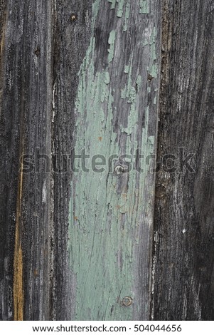 Picture of texture of wooden boards with peeling paint. Abstract background.