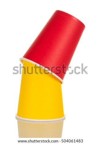 Bright disposable paper cups isolated on white background.