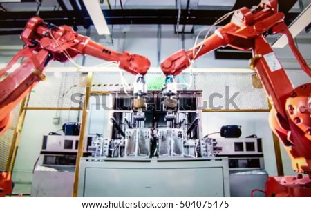 Abstract, blurred, bokeh background, image for the background. Factory for production of mobile phones.