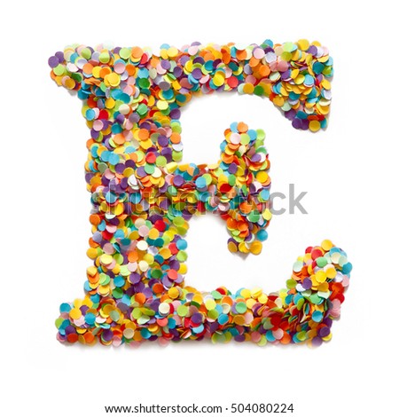 The letter E is laid out colored confetti. White background.