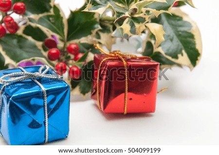 Christmas presents wrapped with a bow on a white background