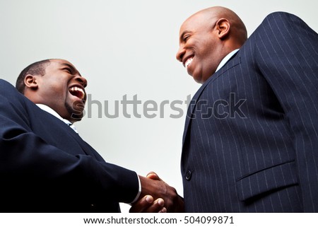 Businessmen making a deal Royalty-Free Stock Photo #504099871