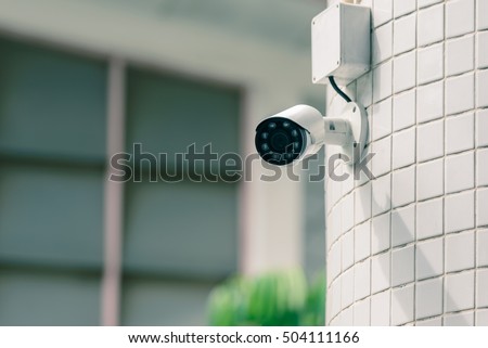 Security IR camera for monitor events in city.

 Royalty-Free Stock Photo #504111166