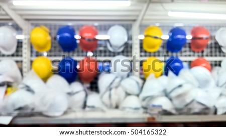 Blurry of Safety helmet on the shelf - Industrial concept - Blurred background

