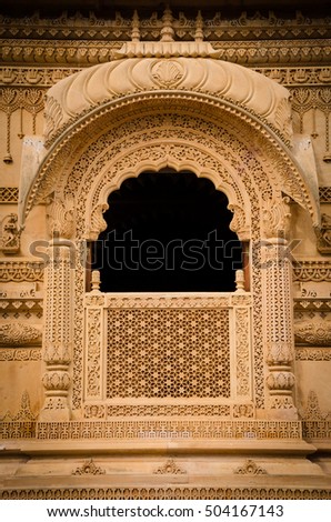 Intricate carvings on a window at Sanatan Temple, Wembly, United Kingdom. Royalty-Free Stock Photo #504167143