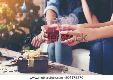 party, holidays, celebration, New Year ,nightlife and people concept - smiling friends with glasses
