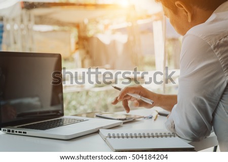 business man working with notebook and laptop 