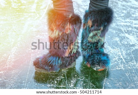 winter furry shoes on the ice surface