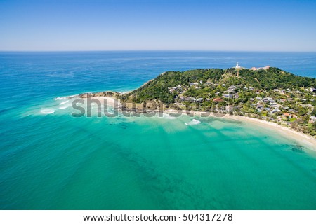 Wategoes Beach aerial view at Byron Bay with lighthouse Royalty-Free Stock Photo #504317278