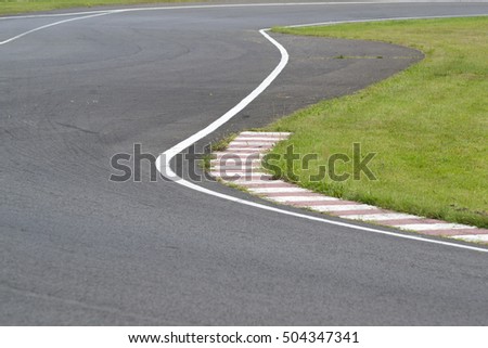 sleek asphalt and danger at the bend of the motorbike track, motoGP