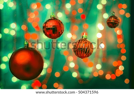 Christmas decorations, bokeh background, out of focus lights, Christmas and Happy New Year defocused abstract background. Very shallow deep of field.