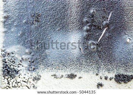 Patterns of spray-paint  in a paintshop photographed quite closed as macro one could indicate as a winter landscape