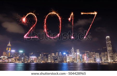 2017 Happy New Year Fireworks celebrating over Hong Kong city at night, view from Victoria Harbour