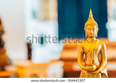 Buddha holding alms bowl statue