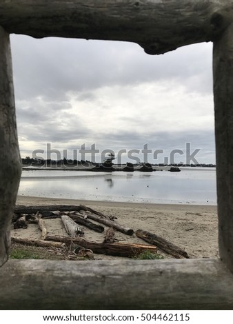 Beach Scene Through Driftwood Frame