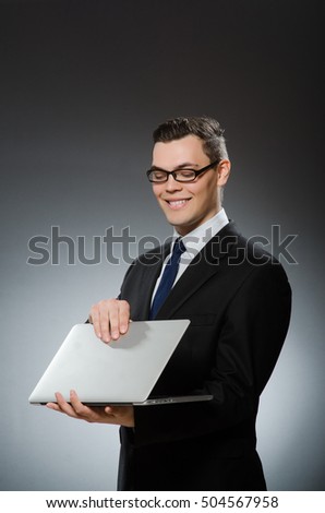 Man with laptop in business concept