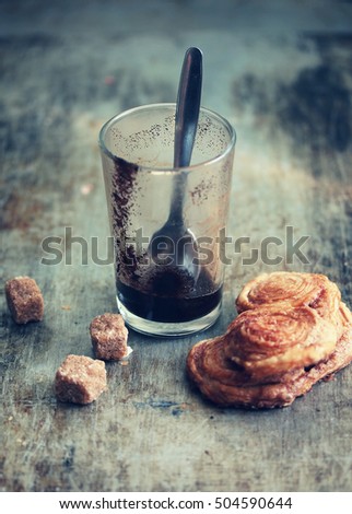 Glass of coffee and cookies - Toned picture