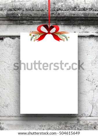 Single blank frame hanged by red ribbon against gray old concrete wall background