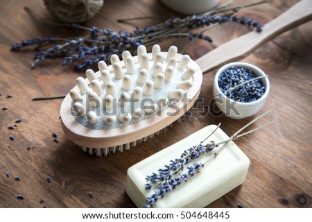 accessories for bath and spa: natural soap, lavender, candle and brush