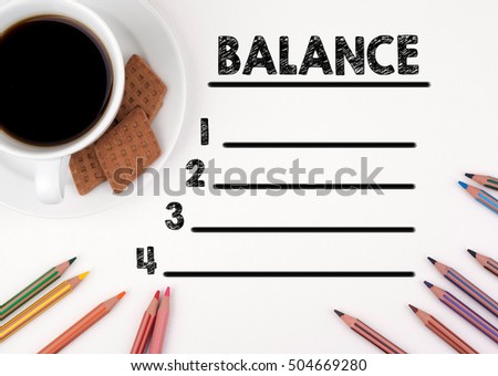 BALANCE blank list. White desk with a pencil and a cup of coffee.