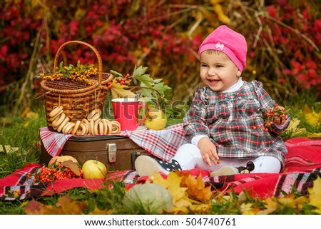 Autumn picture of a little girl
