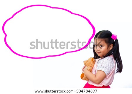 Little Asian Thai girl hug Teddy bear with empty think bubble