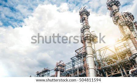 Industrial zone,The equipment of oil refining,Close-up of industrial pipelines of an oil-refinery plant,Detail of oil pipeline with valves in large oil refinery. Royalty-Free Stock Photo #504811594