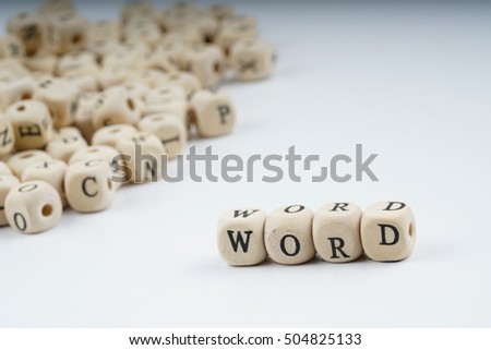 Wooden letter cube with white background