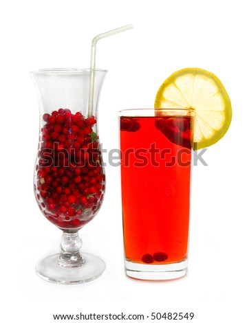 red juice with a slice of lemon and berries