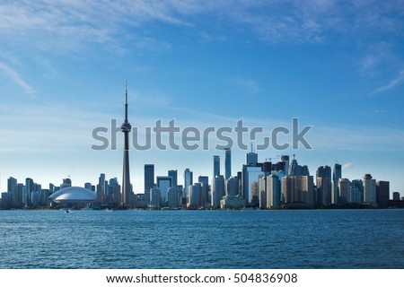 The skyline of Toronto, Canada viewed from the Toronto Islands on a sunny afternoon