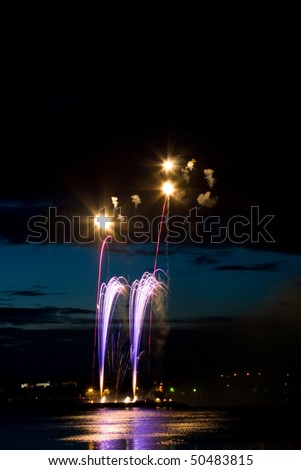 Celebratory bright firework in night sky
