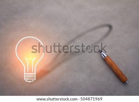 creativity ideas concept with wooden pencil and light bulb icon with shadow on grey leather floor