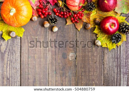autumn fruit and vegetables background. thanksgiving seasonal fruits, vegetables and berries with copy space