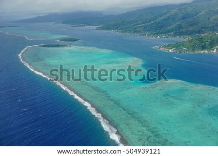 The lagoon and barrier reef of Raiatea island, aerial view, south Pacific ocean, Society islands, French Polynesia