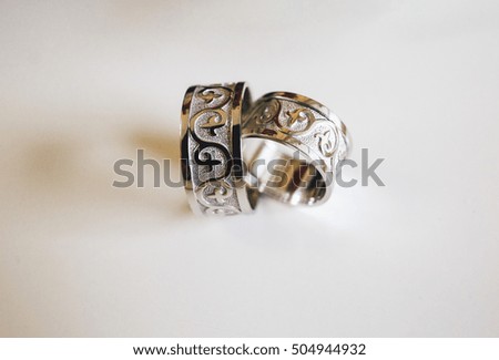 Beautiful silver wedding rings with the ornamentation