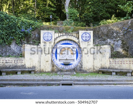 Ancient fountain with a picture of ceramic tiles in the Sintra - Portugal