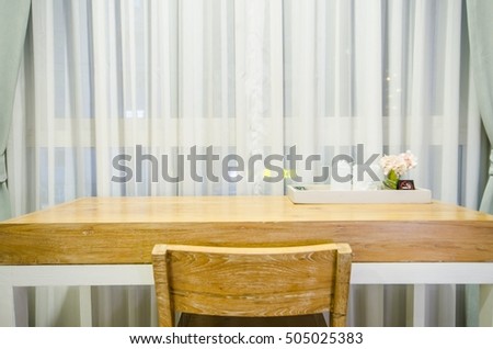 table and chair in workspace with soft light