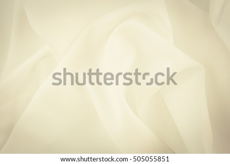 abstract background luxury cloth or liquid wave or wavy folds of grunge silk texture satin velvet material  or elegant wallpaper design, background.
