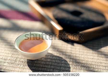 Asian tea set on wooden table
